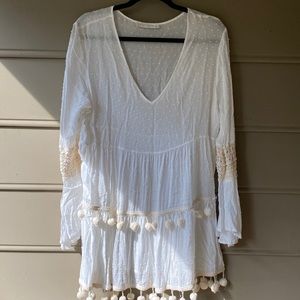 White boho beach coverup with pom poms